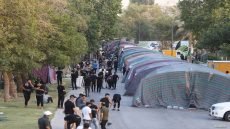 Supporters of the Coordination Framework, a group of Shi'ite parties, gather during a sit-in, amid a political crisis, near the Green Zone, in Baghdad, Iraq August 13, 2022. REUTERS/Alaa al-Marjani