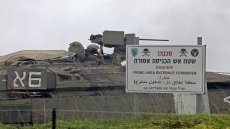 Israeli troops are pictured during a military drill in the Israeli-annexed Golan Heights on January 13, 2021. - Israeli night raids targeting arms depots and military positions in eastern Syria killed at least seven Syrian soldiers and 16 allied fighters, in the deadliest raids this year, a war monitor said. The Israeli air force carried out more than 18 strikes against multiple targets in an area stretching from the eastern town of Deir Ezzor to the Iraqi border, the Syrian Observatory for Human Rights said. (Photo by JALAA MAREY / AFP)