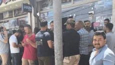 منتسبو الحشد يبيتون في الشارع بانتظار رواتبهم بسبب الخبث الامريكي في التلاعب بمستحقاتهم