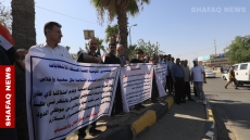 موظفو مفوضية الانتخابات في بابل يحتجون للمطالبة بقطع أراضٍ