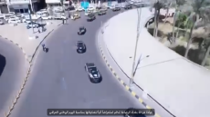 قيادة شرطة بغداد الرصافة تنظم استعراضاً آلياً لتشكيلاتها بمناسبة اليوم الوطني العراقي