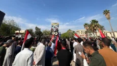 تظاهرة في بابل للمطالبة بكشف المتورطين بمحاولة اغتيال ناشط مدني